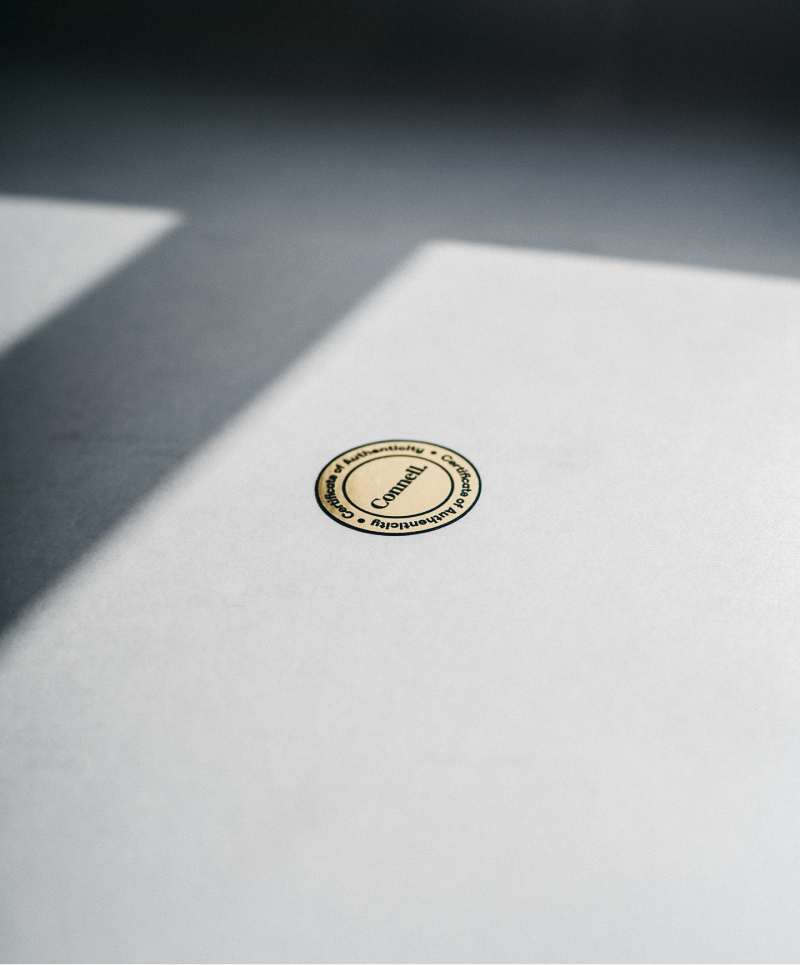 Certificate of authentication on the back of a photography print.